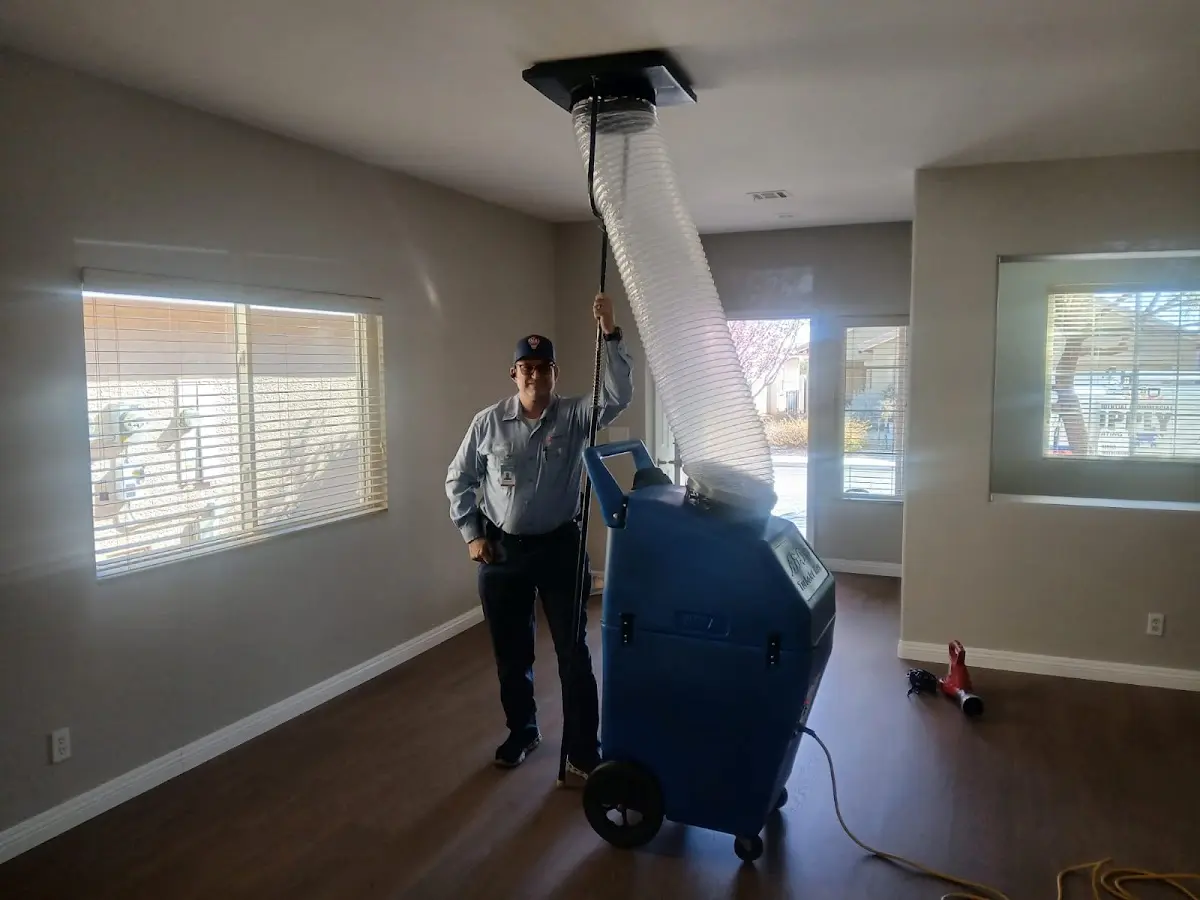 Professional Dryer Vent Cleaning work inside a Kerman home